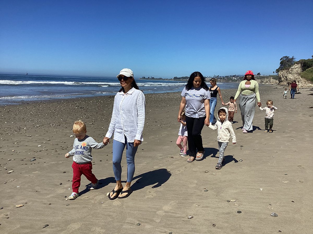 Teacher-Silvia-Trujillo-TAs_Tracy-Garcia-and-Ahjha-Allen-take-children-on-a-beach-walk